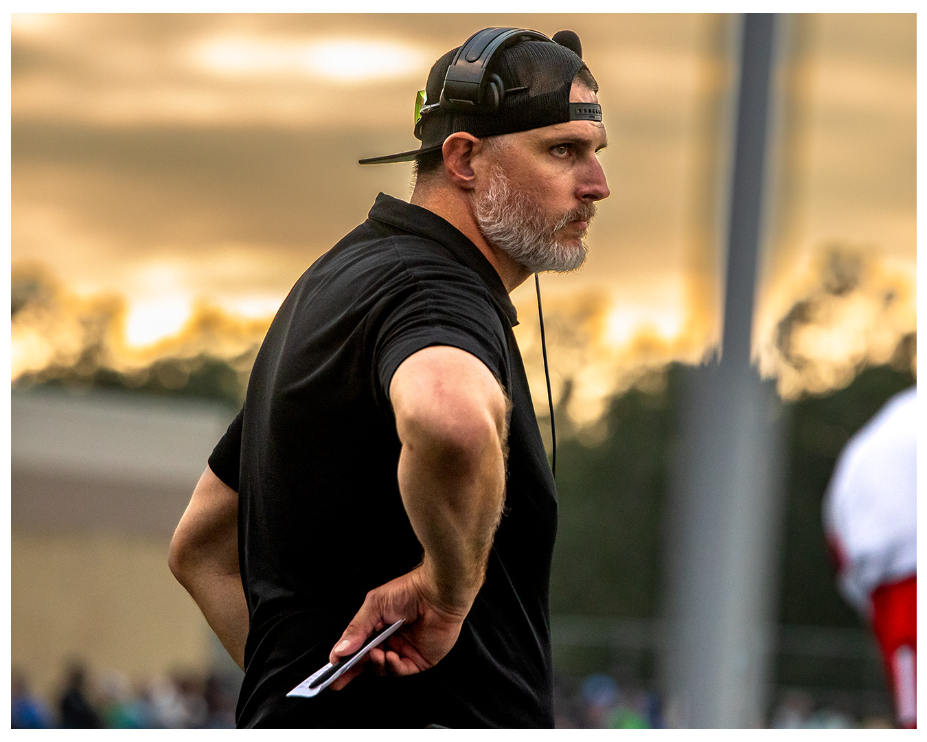 Nate Garner coaching on the sideline at NGU